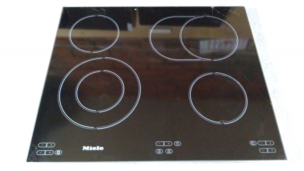 Панель Miele спиральный нагрев,6 зон,до замены стекла.jpg Панель Miele спиральный нагрев,6 зон,до замены стекла.jpg