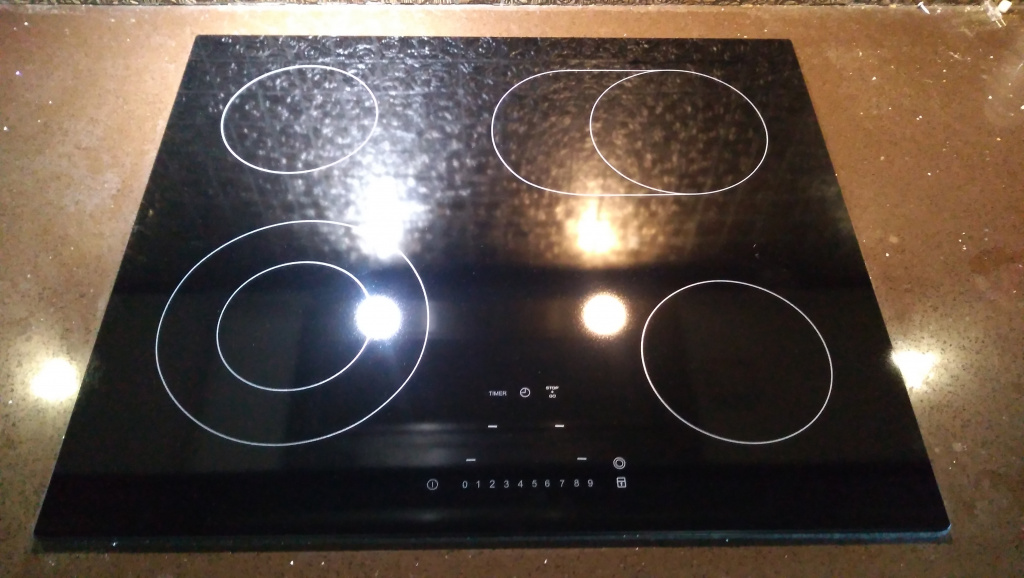 Стеклокерамическая панель Miele ,спиральный нагрев,после замены.jpg Стеклокерамическая панель Miele ,спиральный нагрев,после замены.jpg