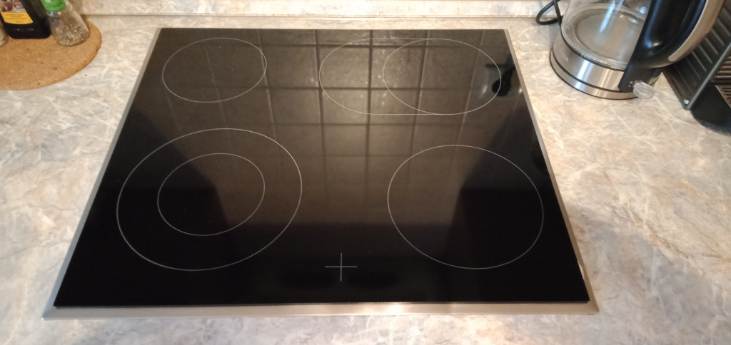 Варочная панель с декоративной рамкой ZANUSSI после замены стекла.jpg Варочная панель с декоративной рамкой ZANUSSI после замены стекла.jpg